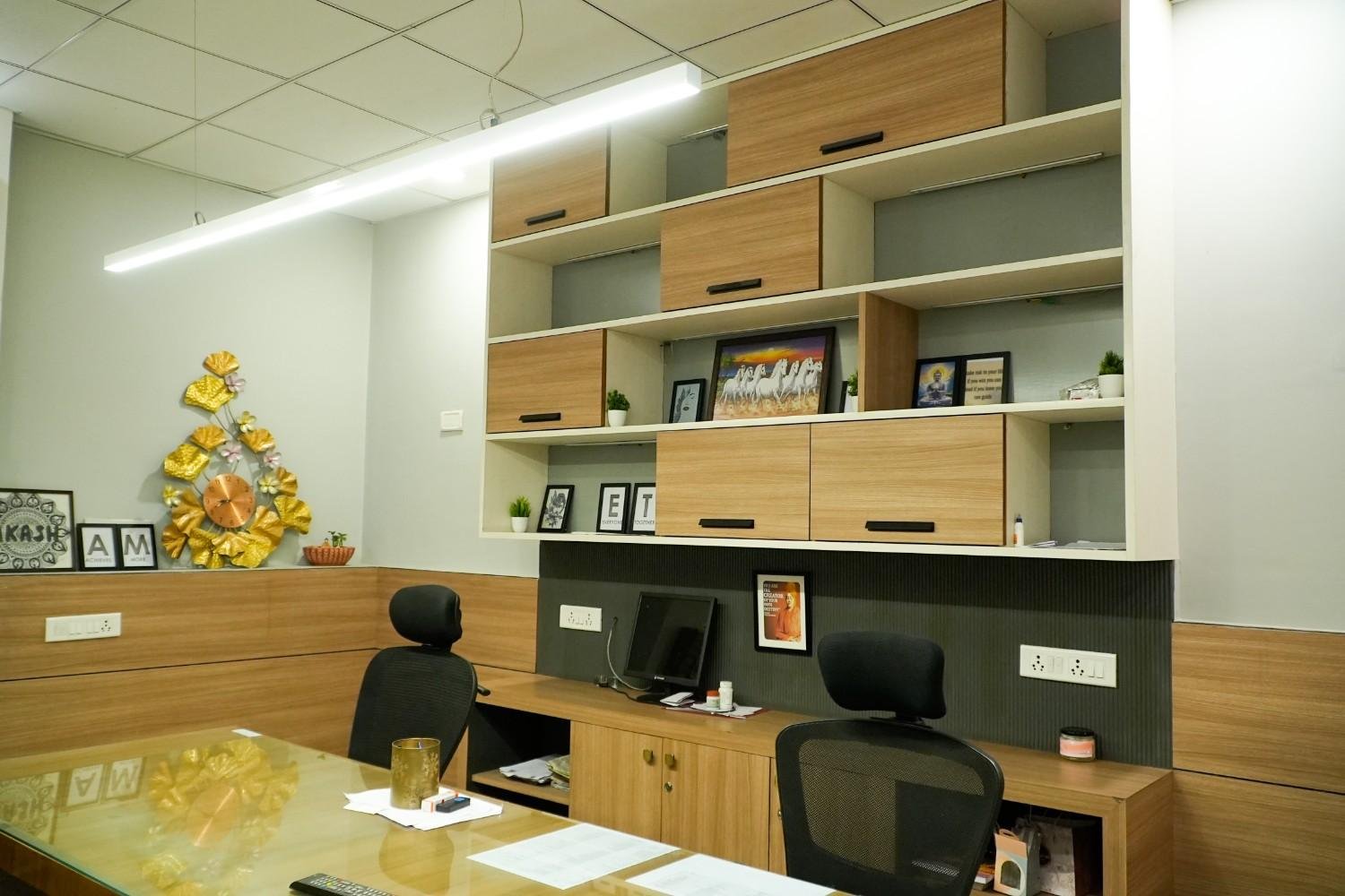 Open workstation IT office interior Jaipur — blue accent wall Infosolution Mansarovar by Endless Interiors