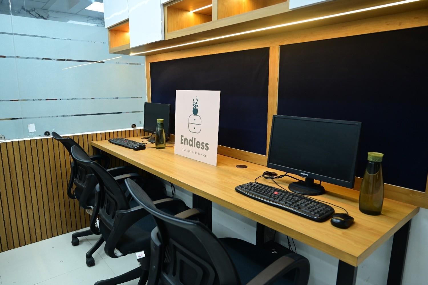 Glass partition corridor black aluminium frame office interior Kota — Endless Interiors and Construction