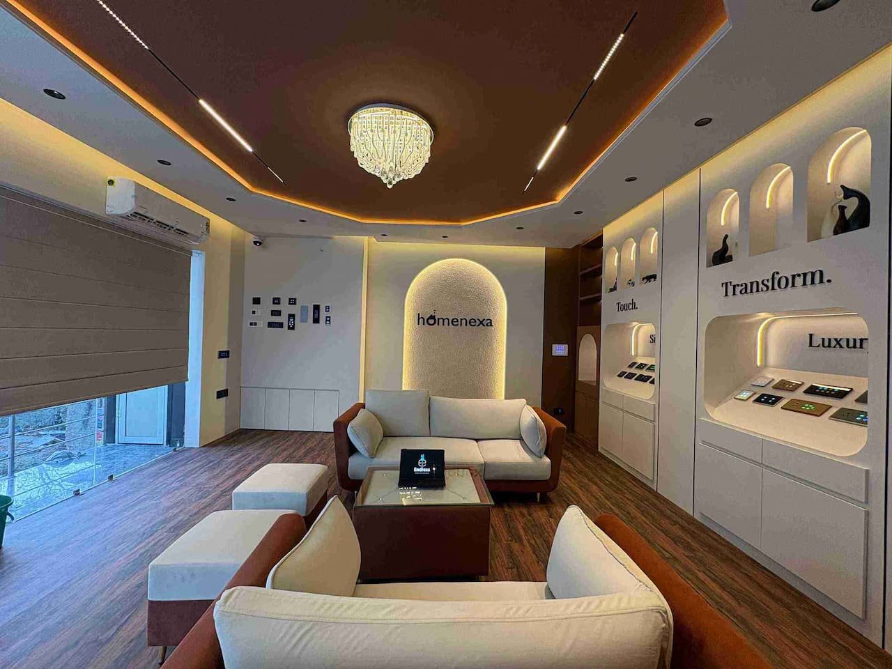 Homenexa smart switch boards controlling chandelier and blinds in showroom Jaipur