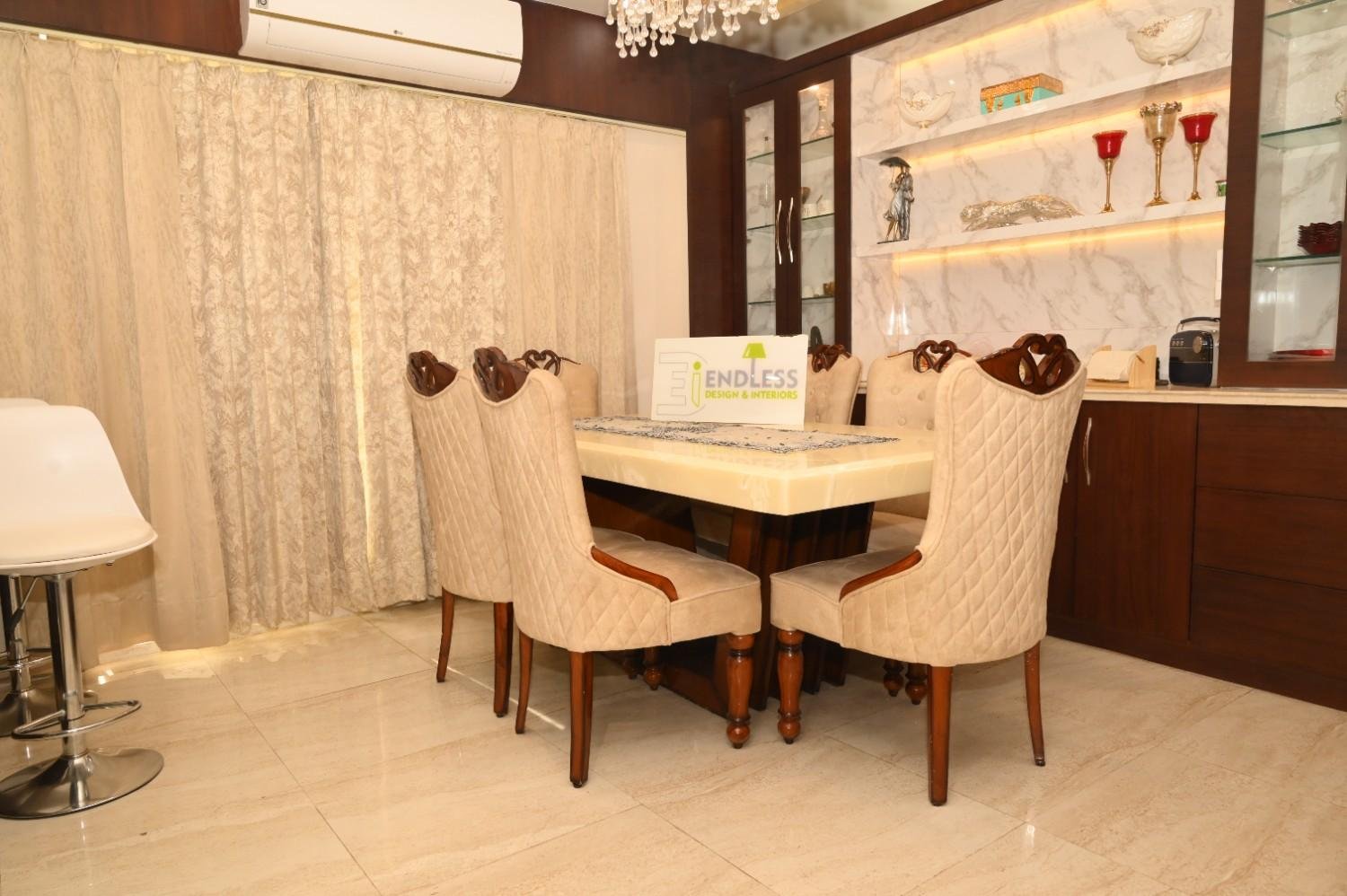 Modular kitchen 4BHK Jagatpura Jaipur — high gloss shutters granite countertop by Endless Interiors