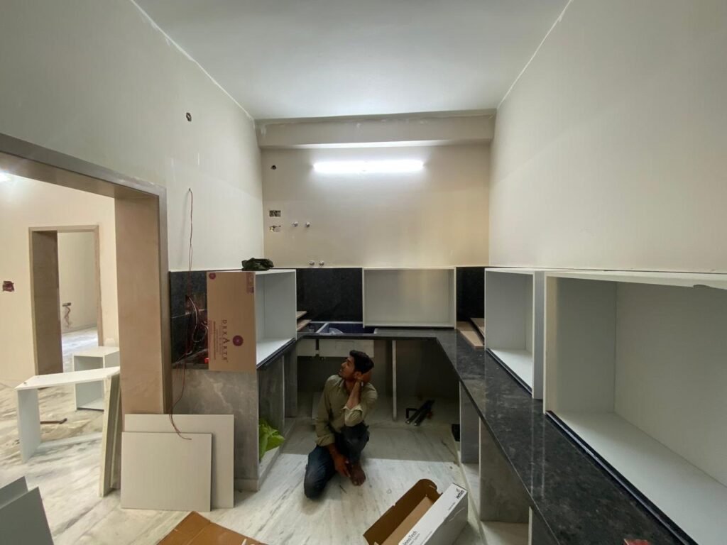 On-site modular kitchen installation and carcass work in Mansarovar Jaipur.